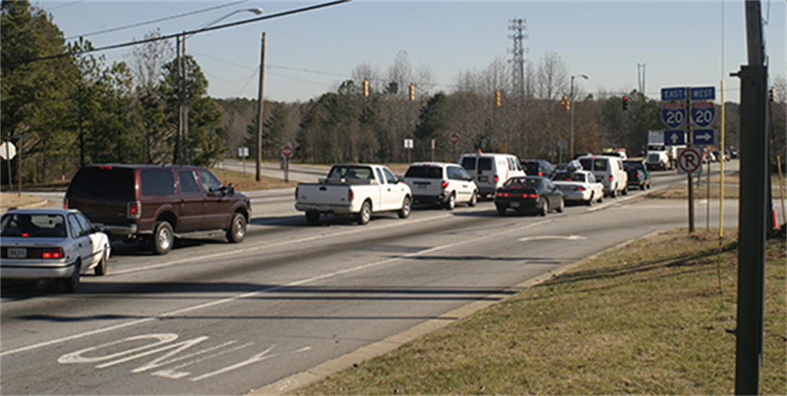 Cars stopped at red light at I-20 and Fairburn Road