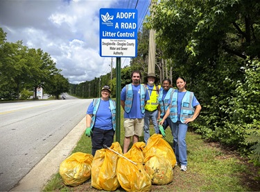 WSA employee volunteers on he KDB adopt-a-road team