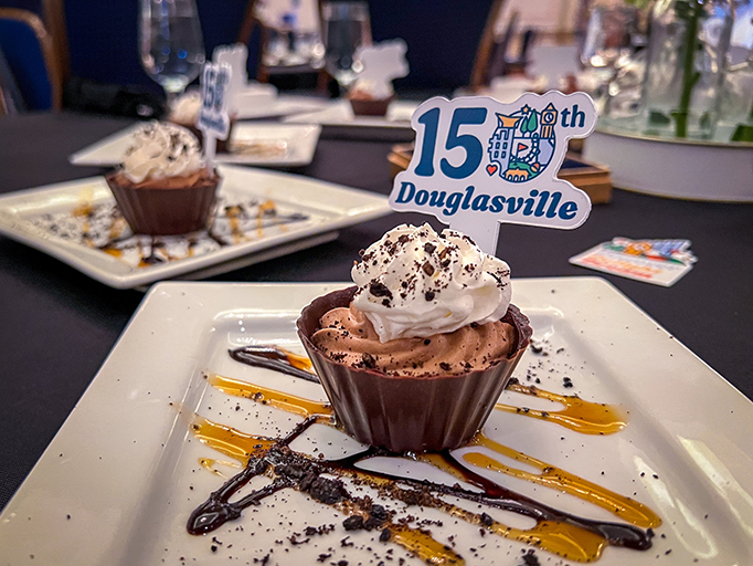 Chocolate desert with 150th logo