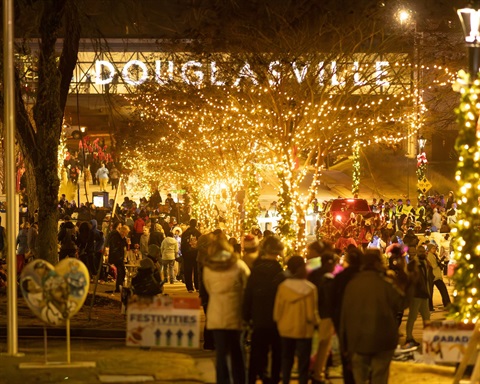 Christmasn lights and people at the Douglasville Town Green