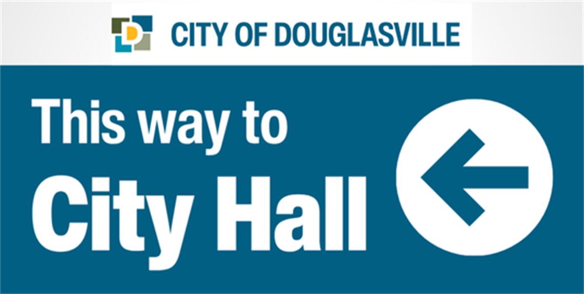 Text: City of Douglasville - This way to City Hall with left pointing arrow